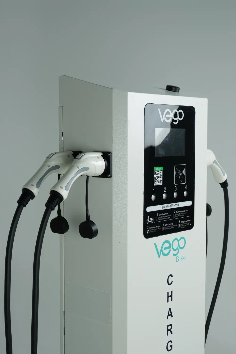 VEGO 22 kW fast charger, angled close-up of the touchscreen and connectors